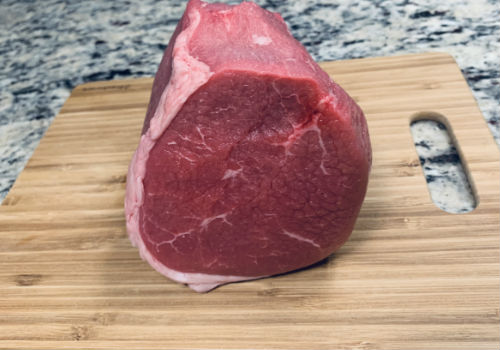Eye of round roast with a thin outer layer of fat