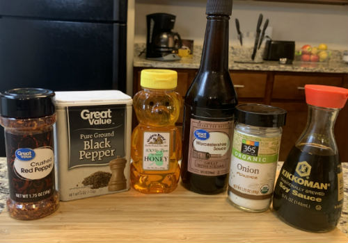Soy sauce, Worcestershire sauce, honey, onion powder, and peppers for the marinade