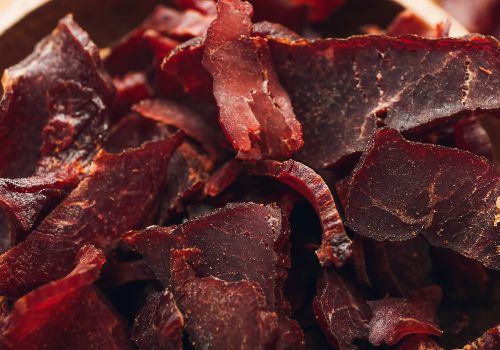 Close-up of curled dried meat pieces