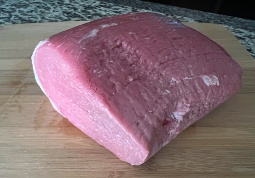 Eye of round beef on a cutting board